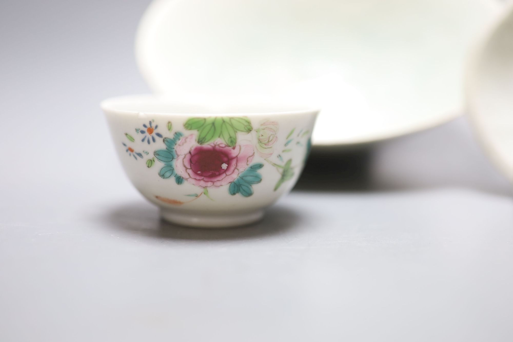 An 18th century Chinese famille rose tea bowl, together with a Qingbai type bowl and dish, largest diameter 17cm